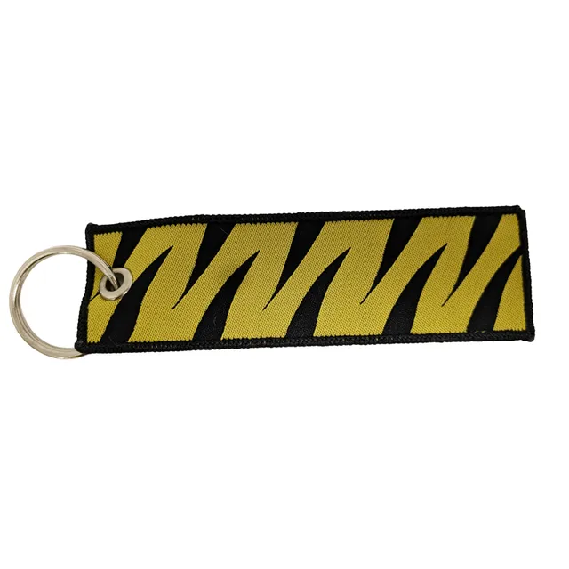 Porte-clés flamme Tiger Meet motif tigre pilote