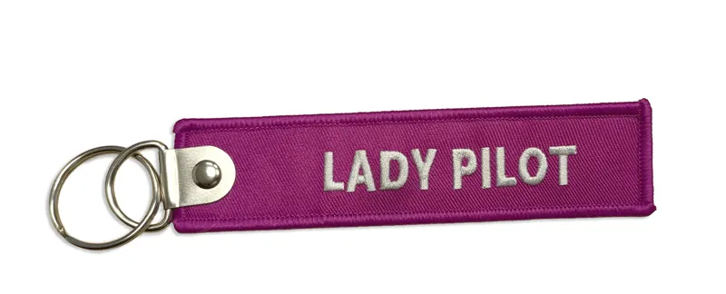 La Boutique du Pilote Porte-clés Flamme Lady Pilot violet tissu