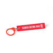 Radne Remove Before Race sangle radiateur rouge