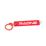 Radne Remove Before Race sangle radiateur rouge